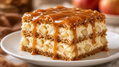 Slice of Caramel Apple Eclair Cake with caramel topping and apple cream layers